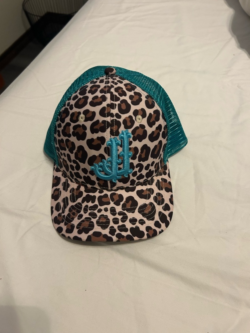 Double j saddlery Leopard Print Trucker Hat with Teal Mesh and Embroidered Logo